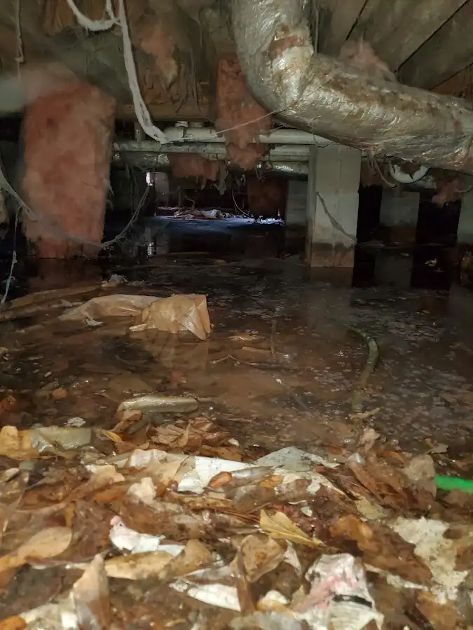 Crawl space flood assessment for Commercial Water Damage Restoration in West Bend